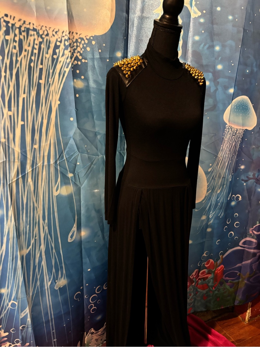 Black Maxi Dress fitted bodice,long sleeves with gold studded shoulders.
